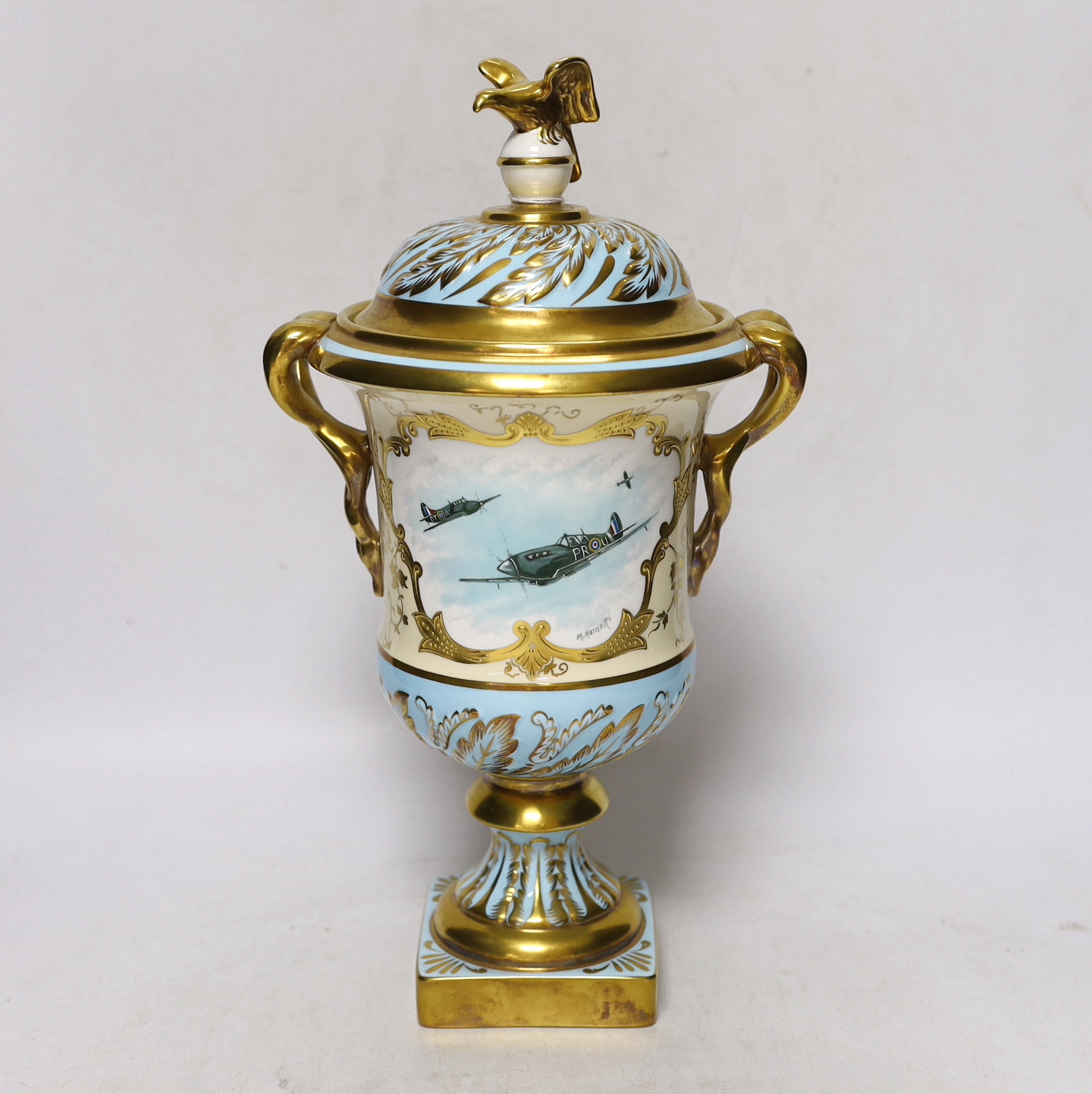 A Coalport boxed presentation urn and cover, signed M Harnett, limited edition of 50, no 40, 32cm high